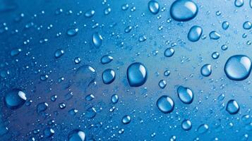 Captivating blue surface adorned with glistening water droplets, showcasing light reflection and subtle texture. Refreshing aesthetic. photo