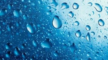 Water droplets on a smooth, light blue surface. Condensation creates a fresh, clean, and invigorating pattern. Refreshing background design. photo