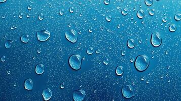 A captivating close-up showcases the beauty of water droplets resting on a vibrant blue surface, each reflecting light in mesmerizing ways. photo