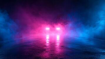 Night lights illuminate a wet surface with vibrant pinks and blues, creating a dreamy, mysterious ambiance. The scene is both captivating. photo