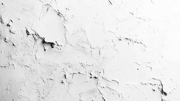 Abstract white background featuring a heavily textured surface with peeling paint and irregular patterns, creating a unique wall backdrop. photo