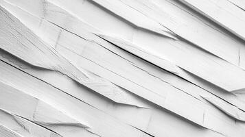 Monochrome wood design features diagonal wooden slats, creating a textured surface with distinct lines and shadows in neutral hues. photo
