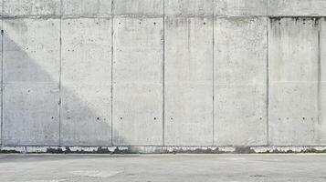 Modern concrete wall with a geometric pattern of panels, ideal for a minimalist background or urban architecture concept. photo