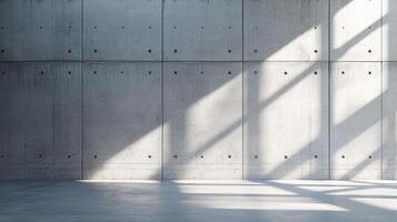 Modern concrete wall and floor bathed in sunlight, casting geometric shadows. Minimalist architecture and industrial design elements. photo