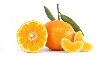 Fresh Oranges with a Slice and Segments on White Background photo
