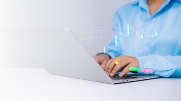 Business finance data analytics graph chart report, Human using laptop computer hand typing investment data digital marketing KPI sale report, Finance and investment management technology. photo