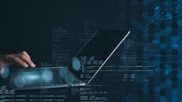 Programmer and cyber security technology, Digital technology, Software development concept. Coding programmer, Programmer use laptop to analyze developments based on various data On the virtual screen photo