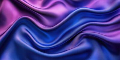 Elegant silk fabric in shades of purple and blue with soft waves and glossy texture creating a luxurious feel and appearance photo