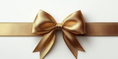 Golden ribbon with bow on white background ideal for gift wrapping and celebration occasions photo