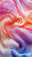 Soft fabric in vibrant pastel colors blending seamlessly with light and texture photo