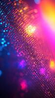 Vibrant color patterns shimmer in mixed lighting at a night event with festive atmosphere photo