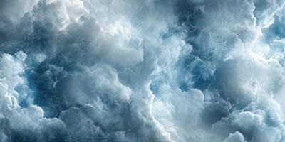 Dramatic cloud formations during late afternoon with varied shades of blue and gray in the sky photo