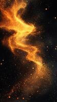 Stunning golden cosmic swirl with sparkling particles against a dark background photo