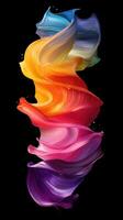 Colorful swirl of paint creates a vibrant abstract design against a black background photo