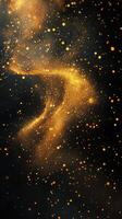 Golden particles swirl in an abstract display of light and movement against a dark background photo