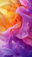 Colorful layers of translucent fabric flow together creating a vibrant abstract composition photo