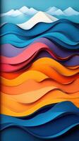 Vibrant layers of paper waves create an abstract landscape with mountains in the background photo