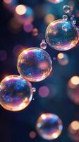 Floating bubbles reflecting colorful light create a captivating visual effect in a dark atmosphere photo