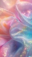 Iridescent fabric drapes gracefully in soft pastel colors with shimmering glitter at sunrise photo