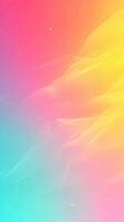 Colorful abstract gradient background with soft waves in vibrant hues of pink, yellow, and blue photo
