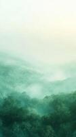 Serene misty mountain landscape at dawn with soft green hues and a sense of tranquility photo