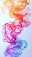 Colorful swirls of smoke create an abstract pattern against a light background in artistic display photo