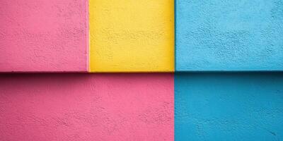 Colorful geometric wall design in a vibrant urban setting showcasing pink, yellow, and blue hues photo
