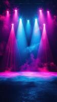 Colorful stage lighting illuminates a performance area with vibrant pink and blue hues creating an electrifying atmosphere photo