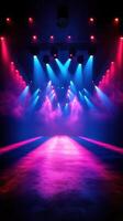 Colorful stage lights illuminate a dramatic performance area with vibrant hues creating an energetic atmosphere photo
