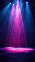 Colorful light beams create a vibrant atmosphere in an empty stage setting at night photo