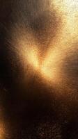 Elegant golden texture with radiant glow captured in warm lighting, perfect for design and artistic backgrounds photo