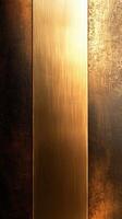 Textured metallic surface with golden and dark tones showcasing an abstract design photo