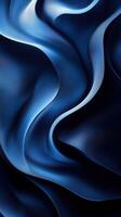 Beautiful blue satin fabric flowing gracefully with soft curves and textures creating an elegant background photo