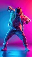 Energetic dancer performing under vibrant neon lights in a modern urban setting photo