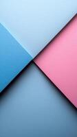 Colorful paper sheets arranged in a geometric pattern on a flat surface creating a visually appealing contrast photo