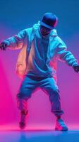 Vibrant urban dance performance illuminated by neon lighting during a lively night event photo