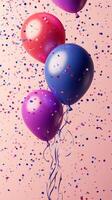 Colorful balloons floating amidst vibrant confetti create a festive atmosphere for celebrations photo