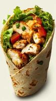 Delicious grilled chicken wrap filled with fresh vegetables and tangy sauce ready to satisfy anyone's hunger photo