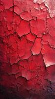 Cracked red wall texture shows vibrant patterns and deep contrasts on an old surface photo