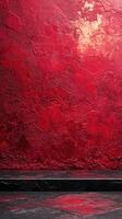 Wall with rich red texture and dark flooring creates an impactful backdrop for artistic presentations and exhibitions photo