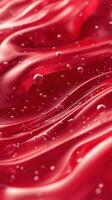 Bubbles rising in a flowing red liquid, creating mesmerizing patterns and textures under soft lighting photo
