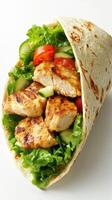 Grilled chicken wrap filled with fresh vegetables, perfect for a healthy lunch or snack option photo