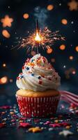 Festive cupcake topped with sparkler, colorful sprinkles, and stars for celebration photo