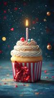 Celebratory cupcake with a candle and festive decorations for a birthday party photo