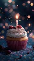 Delicious cupcake with festive decoration and candle shining brightly during a celebration photo