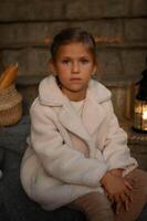 A young girl in a white coat stands in the evening light, holding a basket of fresh bread. A lantern glows softly in her hands, illuminating her gentle face and creating a warm, nostalgic atmosphere photo