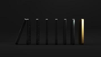Domino game on a black background. Domino effect business concept, logo for companies, trainings. Board game of dice with a winner and a loser. photo