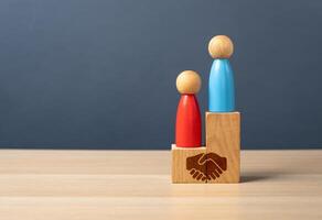 Agreement between competing opponents. To make a profitable deal. To be equal with the opponent. Create balanced partnerships. Win-win outcomes. Business and diplomacy photo