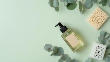 Eucalyptus leaves and soap on a green background photo