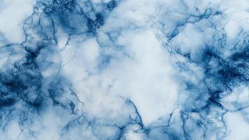 An abstract representation using swirling patterns of deep blues and whites for a calming and unique background. Ideal for textures. photo